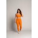 Vue arrière du legging gainant sport femme orange